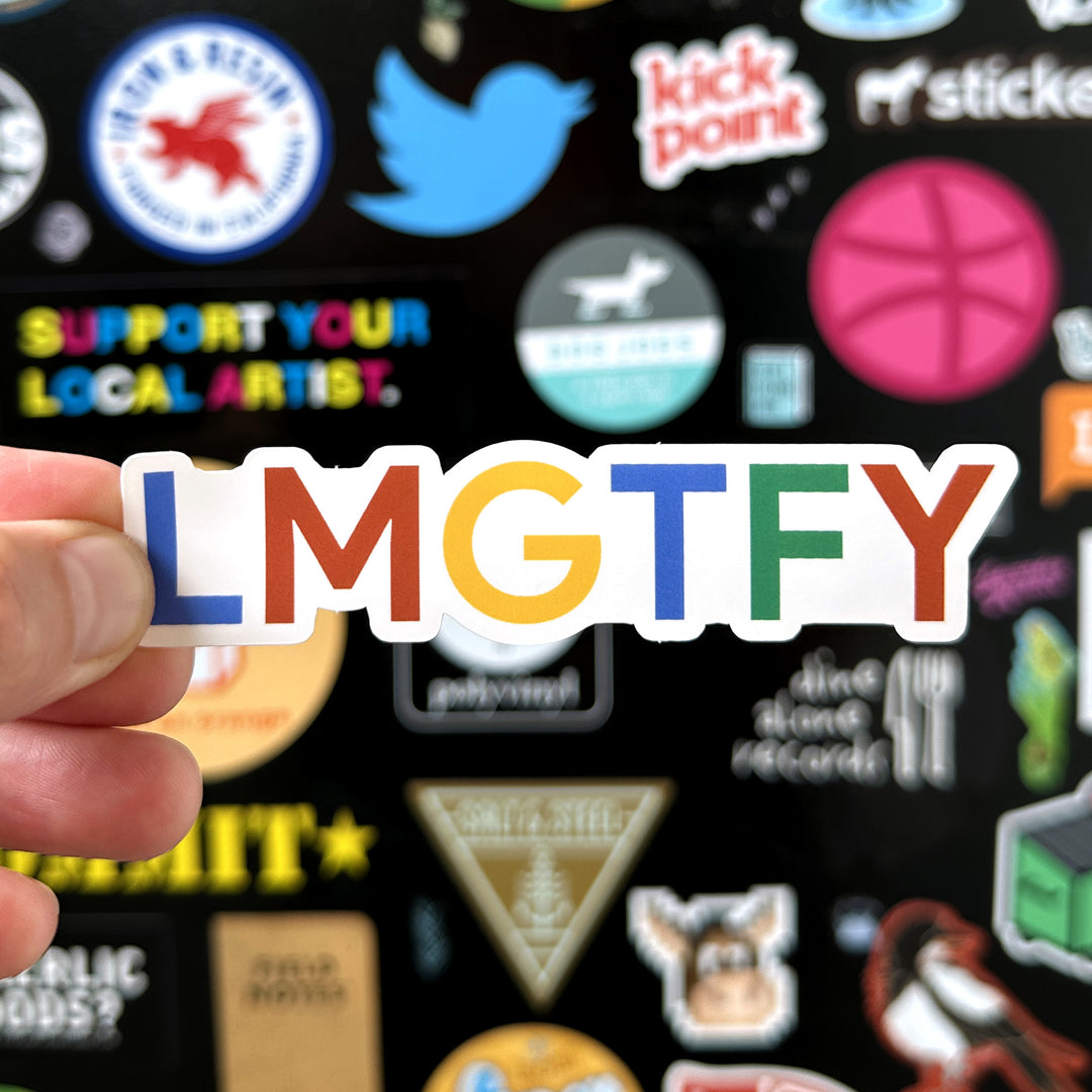 LMGTFY sticker being held with a sticker door in the background
