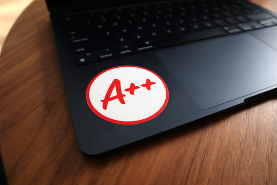 A++ sticker on a laptop